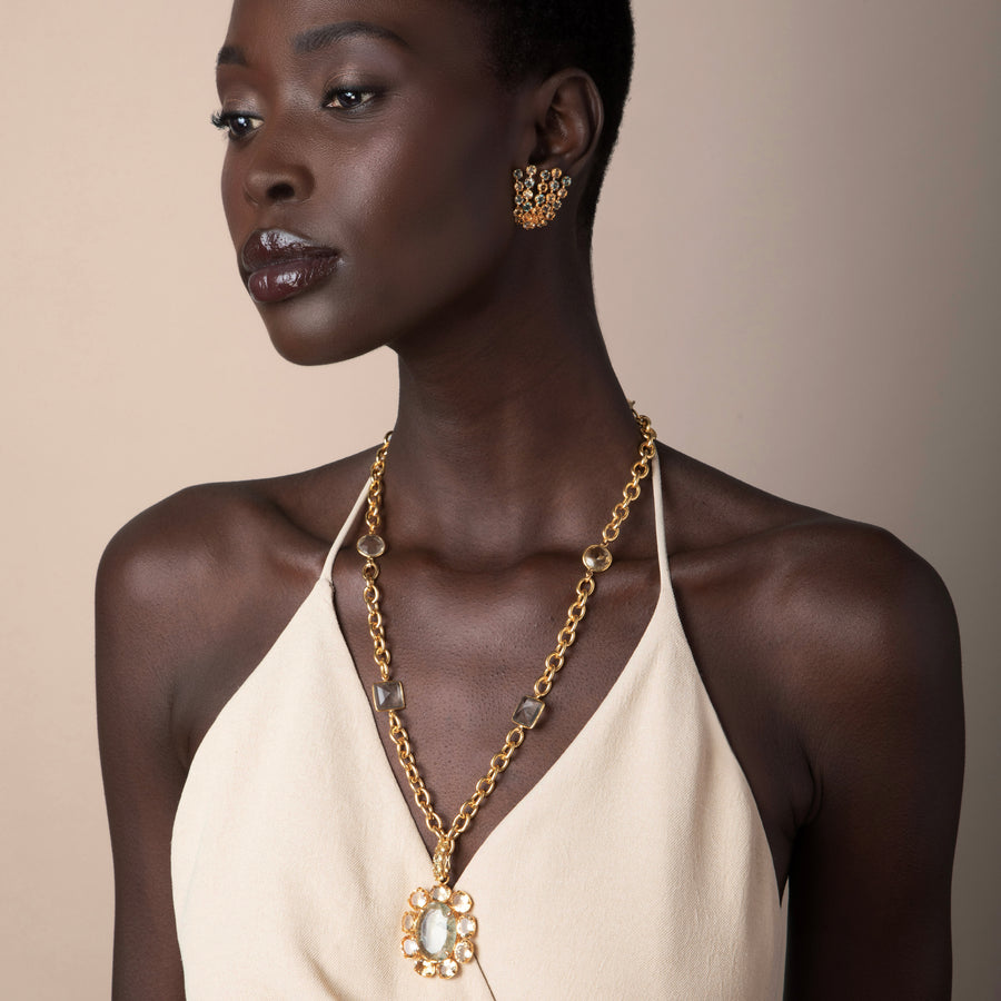 Model wearing Bounkit Juniper Necklace – 14k gold-plated chain with semi-precious stones and removable Art Deco pendant, styled with Juniper Studs.