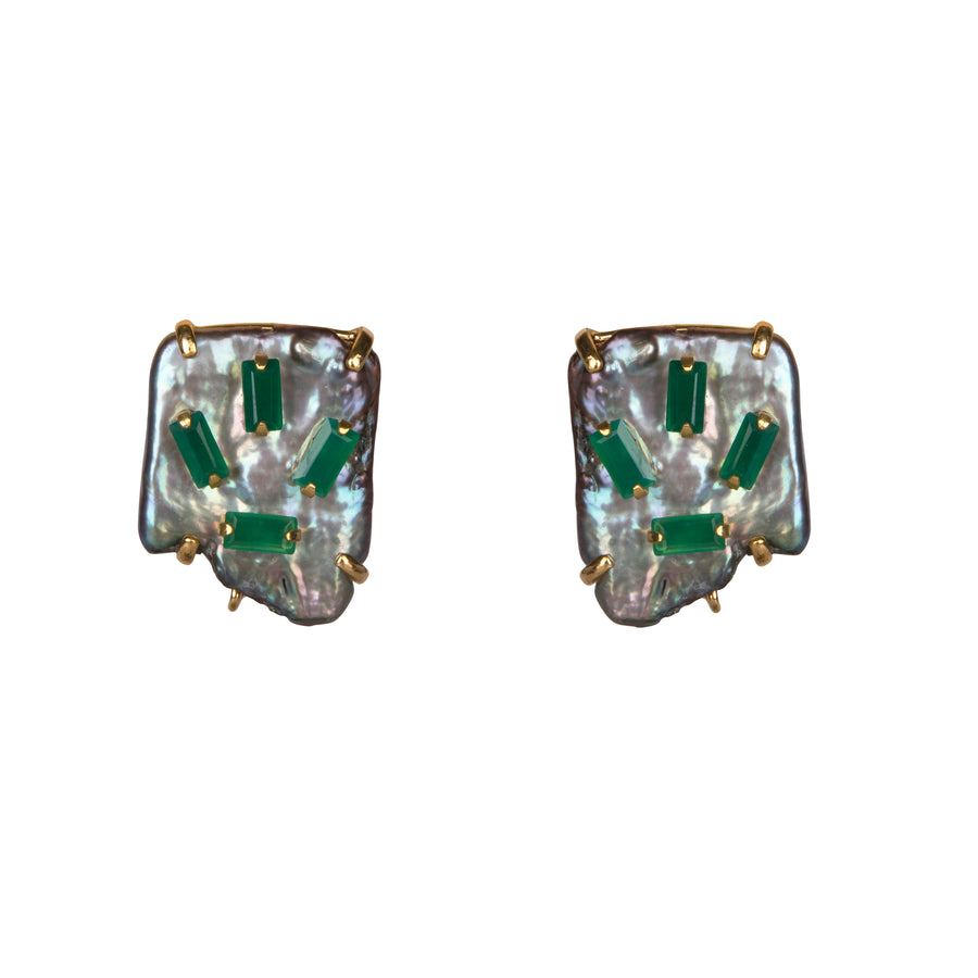 Pair of earrings with green gemstones on a white background