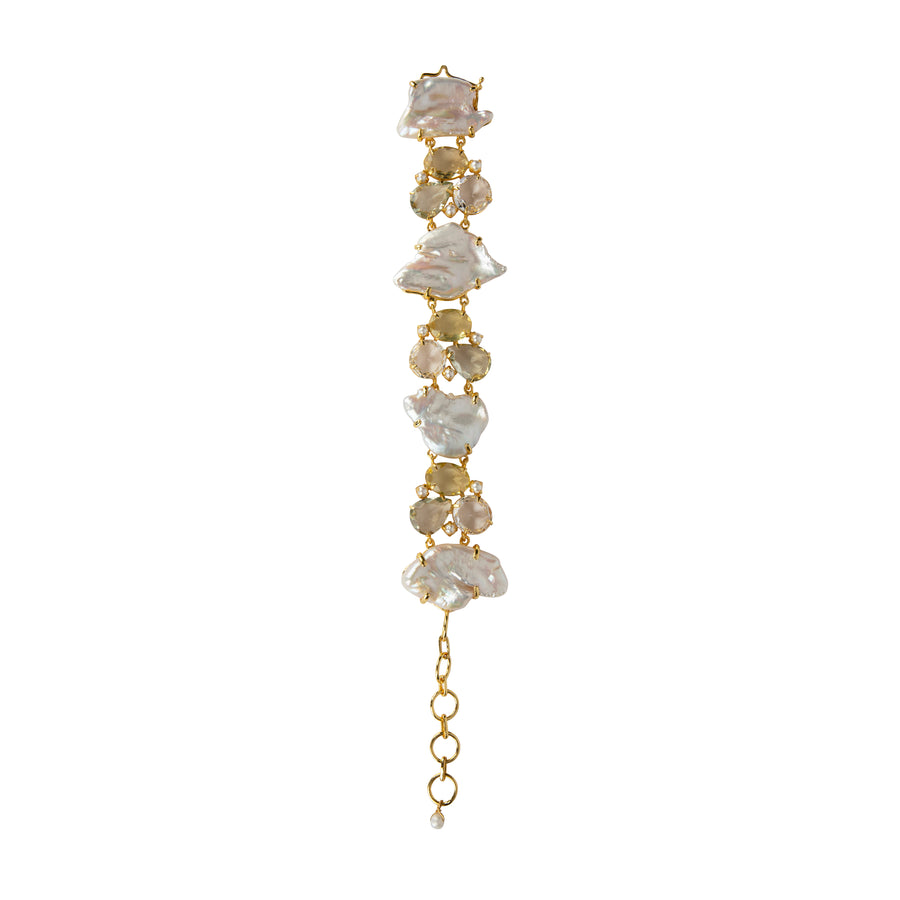 Bracelet with irregular pearls and rectangular yellow gemstones framed by pearls and pale-yellow stones in an Art Deco-inspired design.
